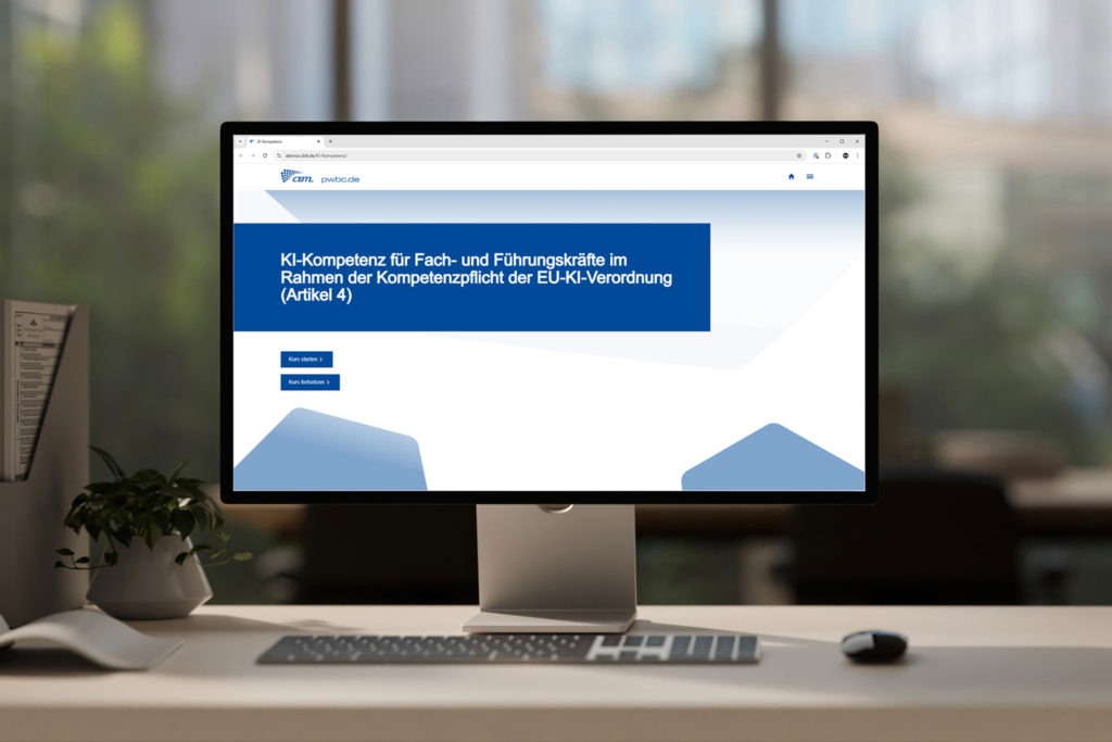The image shows the start page of the AI competence course in accordance with the EU AI Regulation on a desktop monitor.